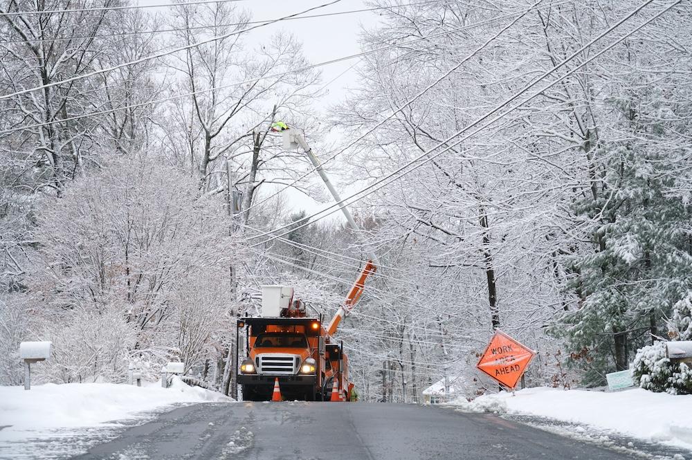 Power crews out restoring downed power lines after a storm.