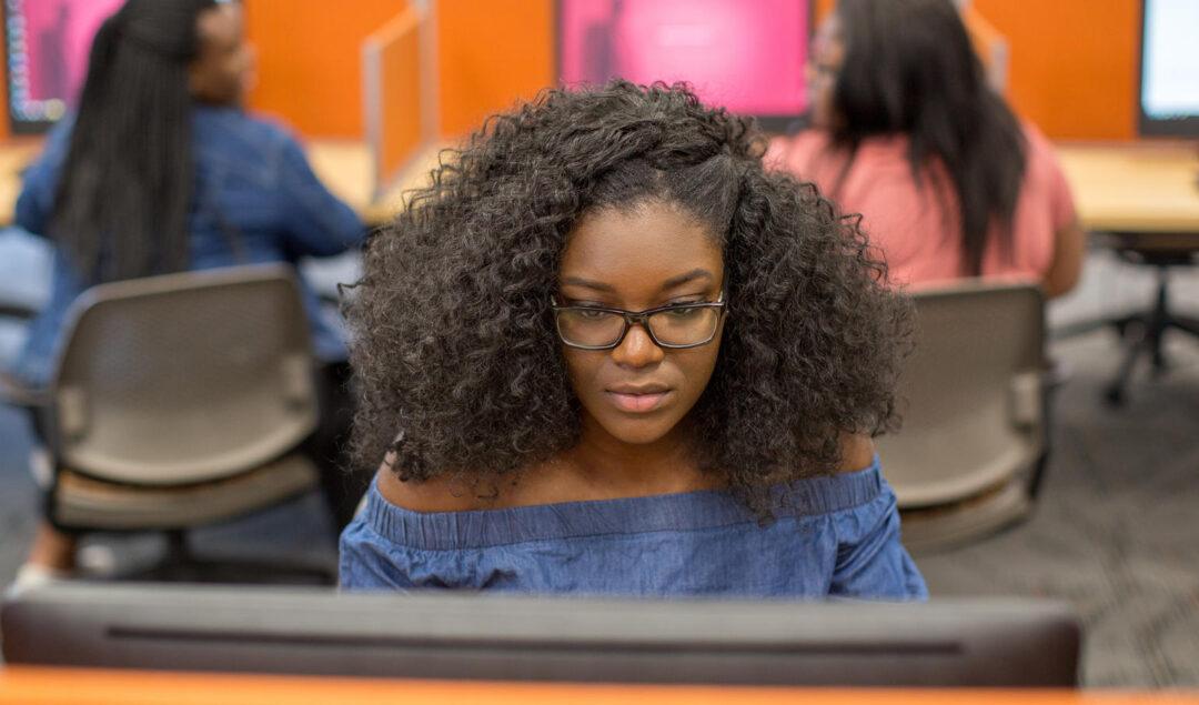 Image courtesy of POCIT person of color on the computer