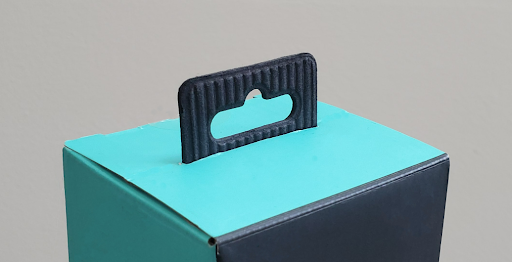 Paper hang tag on Logitech product