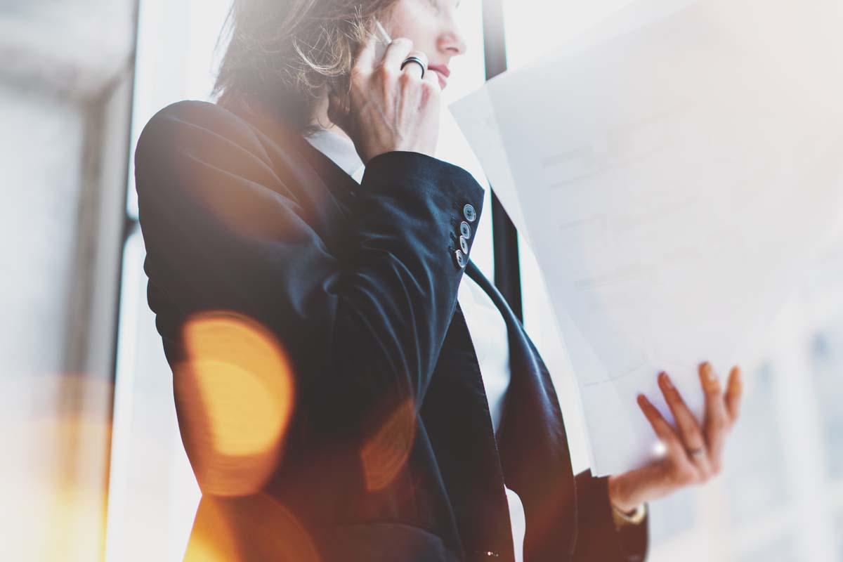 woman speaking into a phone