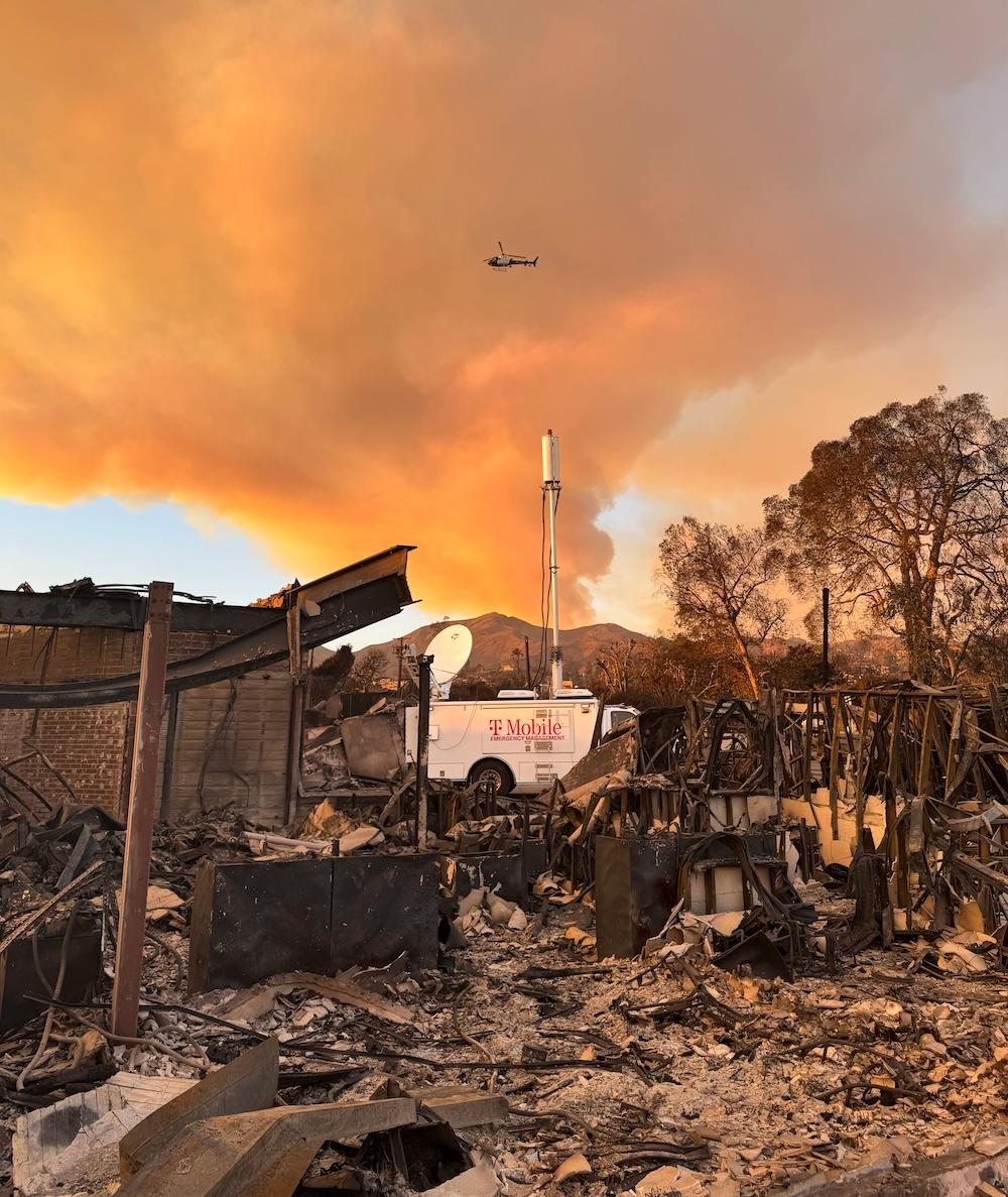 T-Mobile truck in area recently destroyed by fire