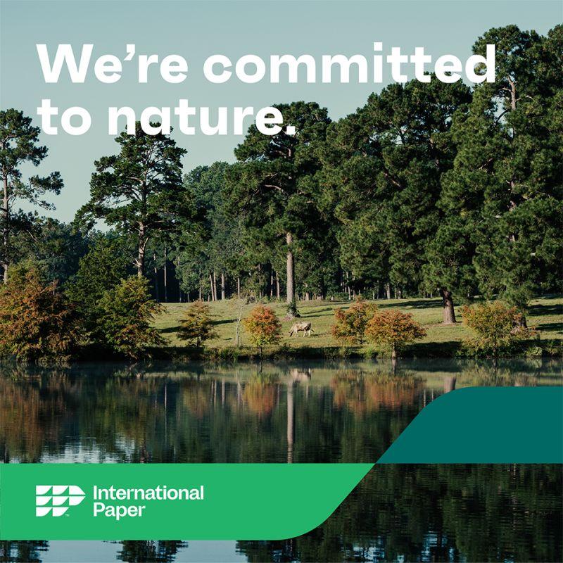 "We're committed to nature." superimposed on landscape with the International Paper logo at the bottom