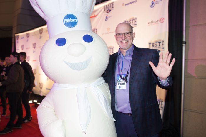 The Pillsbury Doughboy with General Mills Chairman and CEO Jeff Harmening, at the 2018 Taste of the NFL in St. Paul, Minnesota.