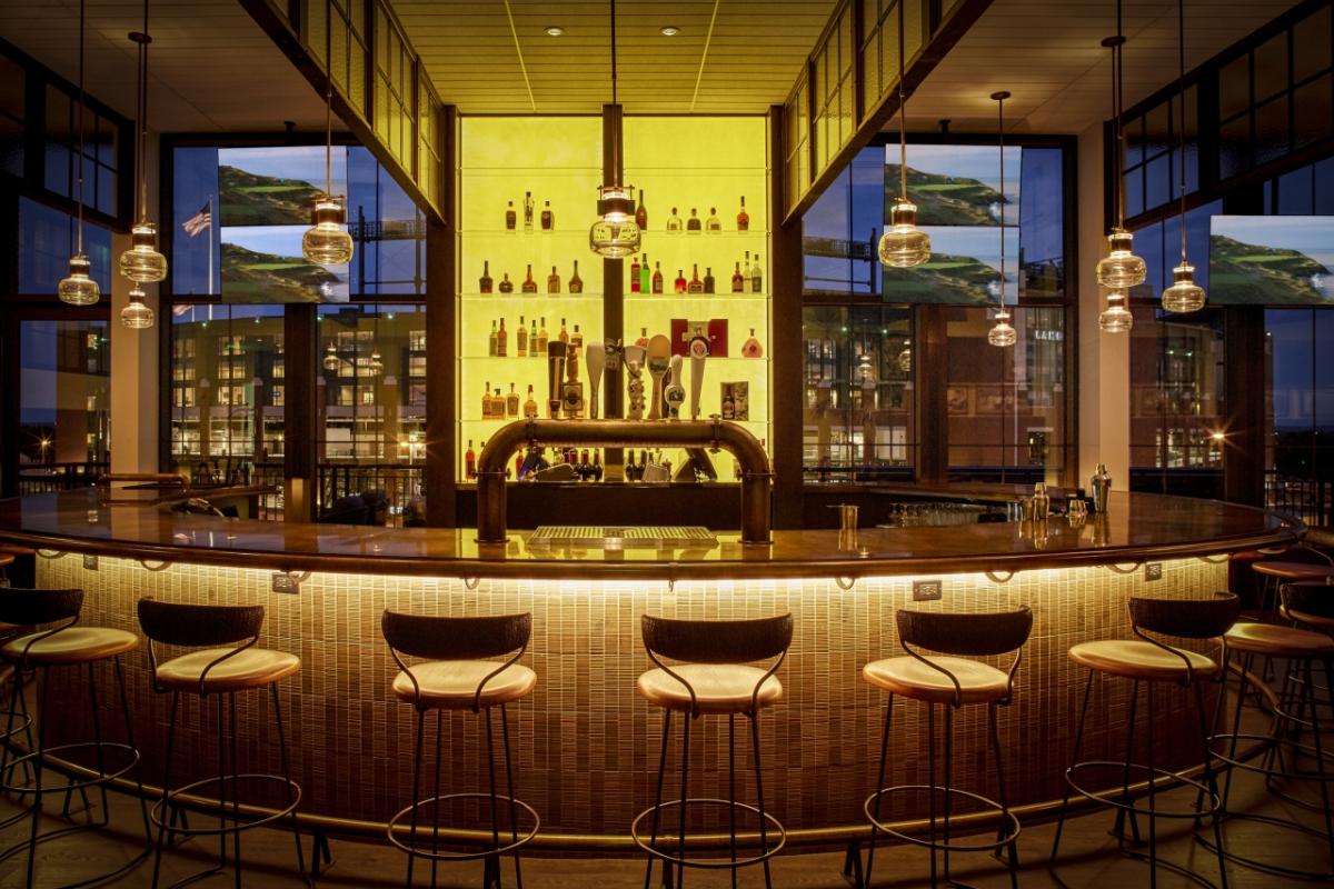 Chairs in front of a bar