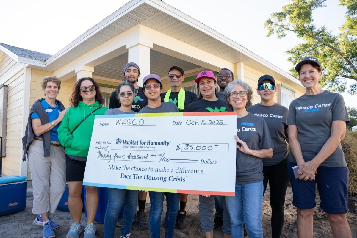 Team Wesco shown with a grant check for $35,000.