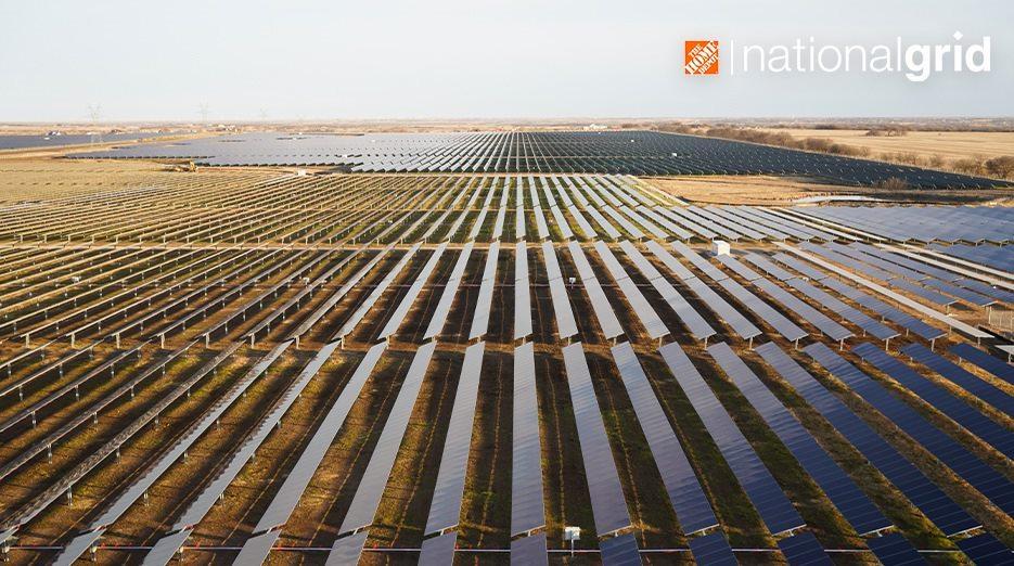 Field of solar panels shown from overhead with The Home Depot Logo.