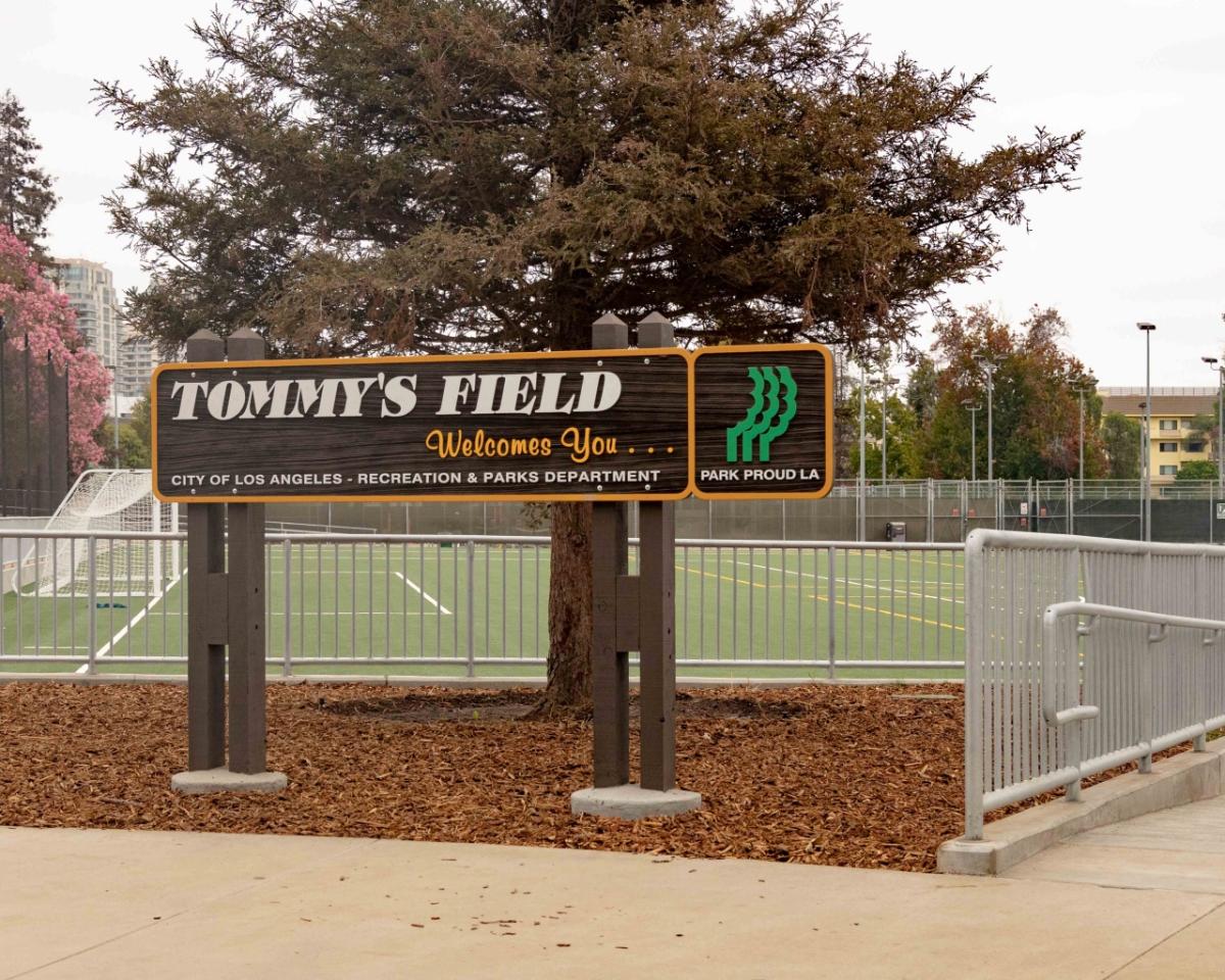 The official City of Los Angeles Parks sign displays "Tommy's Field" outside of the pitch. 
