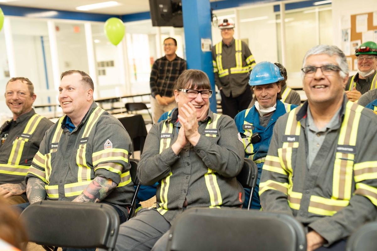 Saint-Gobain Canada employees seated at a company meeting.