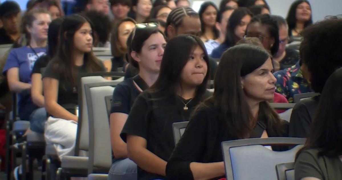 Students listening to presentation