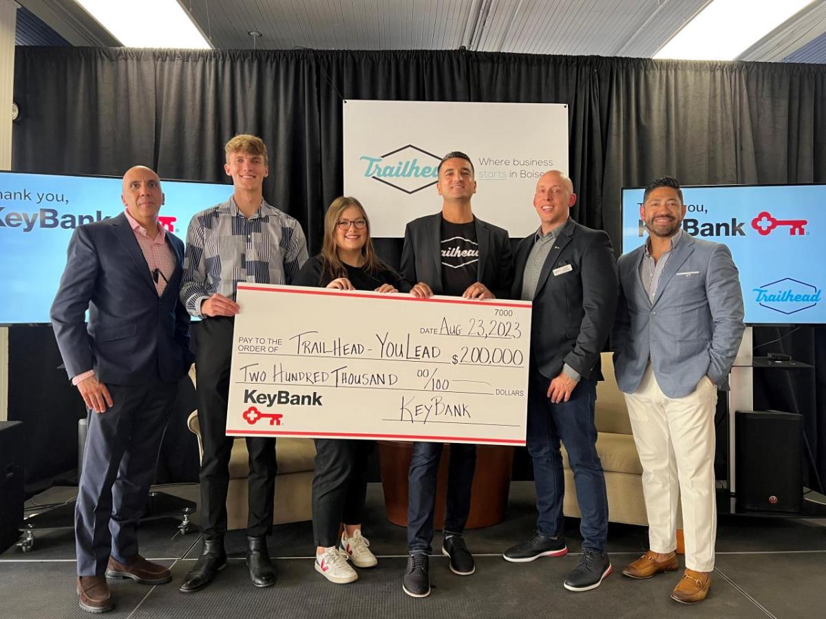 Group of people holding a cheque awarded from Keybank