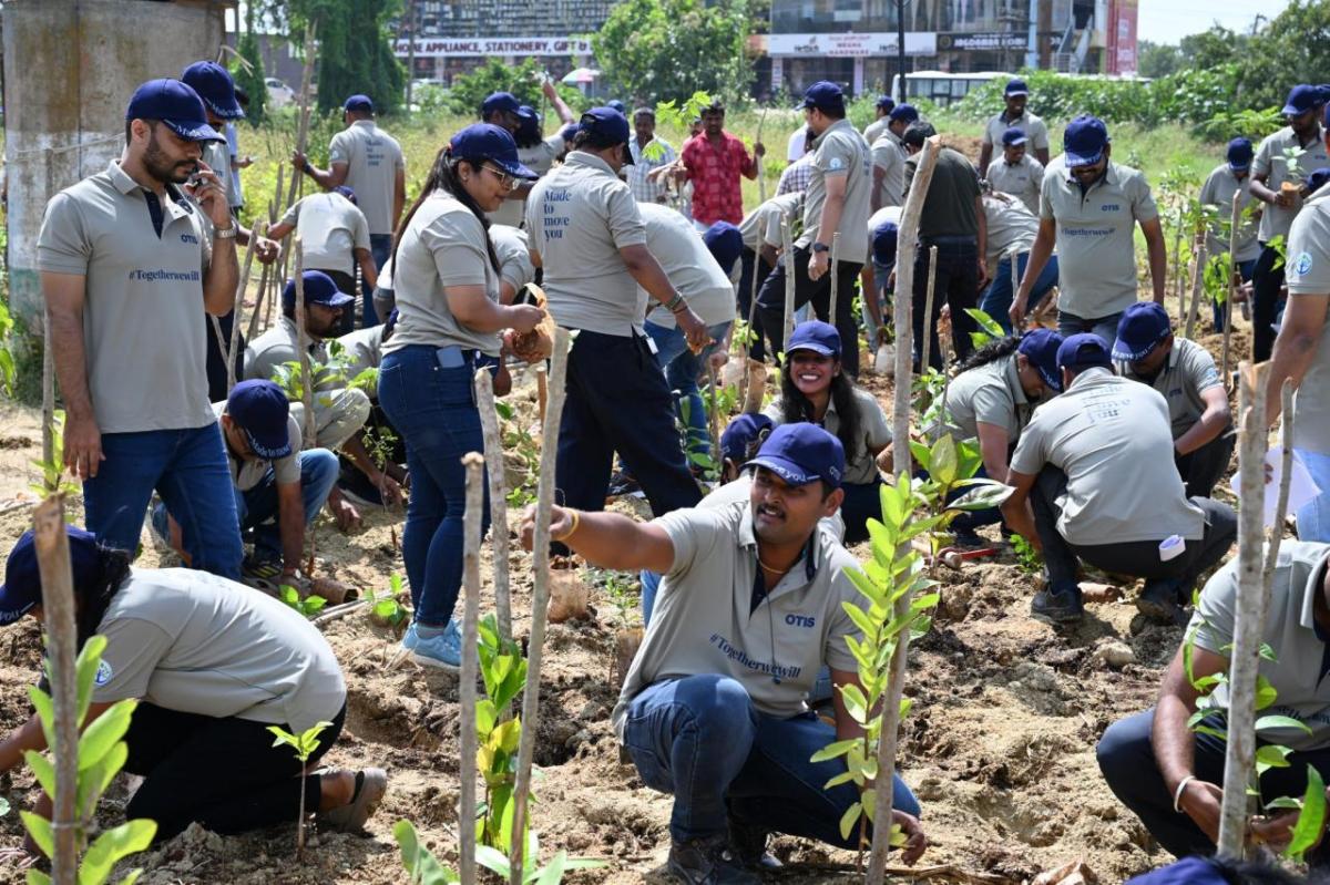 Otis volunteers work on native tree planting initiative in major cities across India. Otis volunteers planting native trees and plants