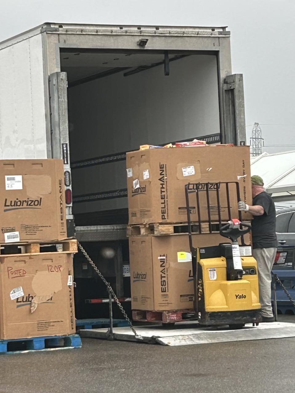 Gleaners employee loads cereal into semi 