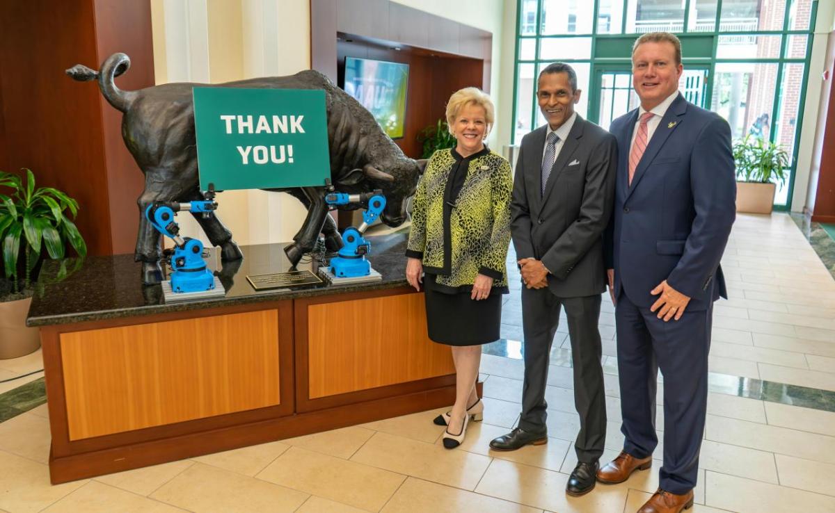 On Friday, June 23, 2023, (L-R) University of South Florida (USF) President Rhea Law, Truist West Florida Regional President Iwan Mohamed, and USF Foundation CEO Jay Stroman announced a $684,000 grant from Truist Foundation to fund the launch of USF’s smart manufacturing certificate program in East Tampa, Florida. " "