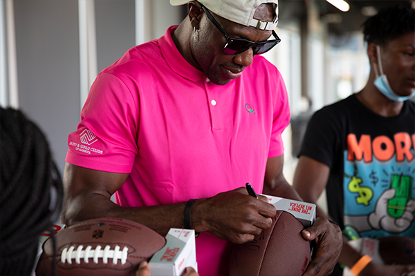 Terrell Owens signing football 