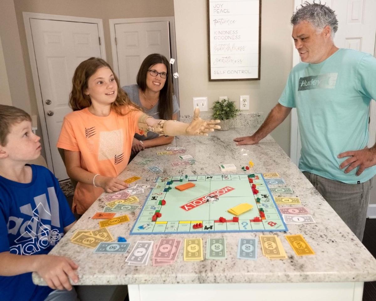 family playing monopoly 