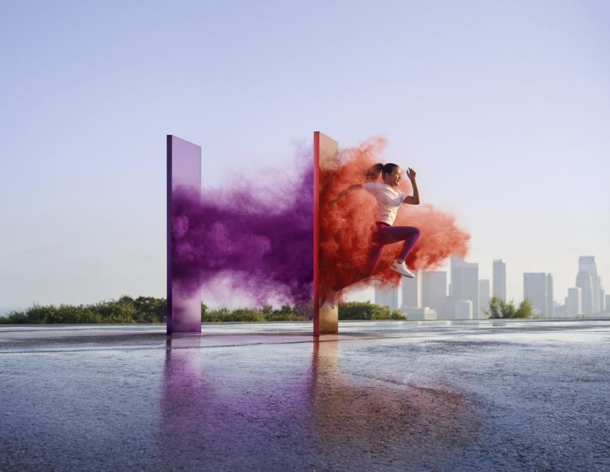 image of runner running through colors