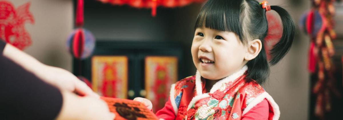Young Asian girl celebrating the Lunar New Year.