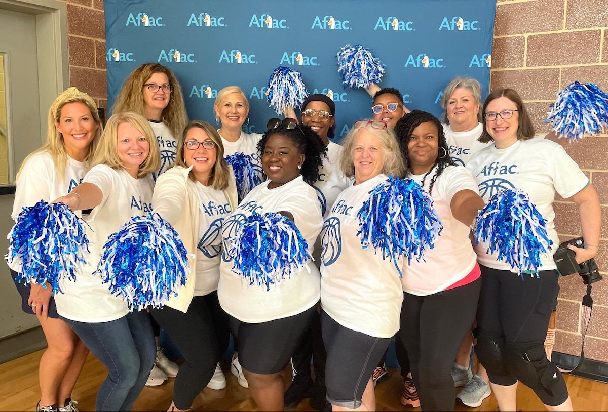 Aflac Volunteer Team: Front row: Amanda Grover, Loren Phipps, Lindsay McCutcheon, Della Law, Angela Kyzer, Sabrina Jackson, Julie Watson. Back row: Jennifer Rogers, Christina McArthur, Claudia Mikell, Sloan Greenway, Tammy Gilson.