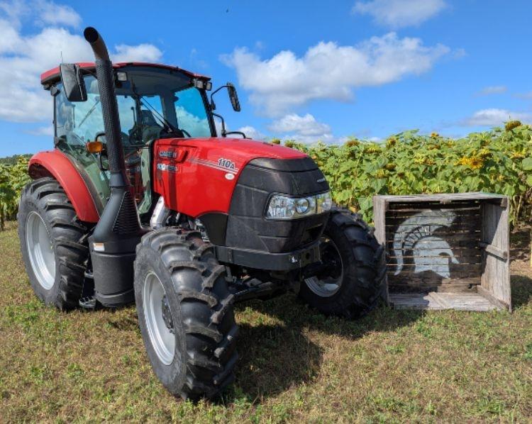 red tractor outside in field