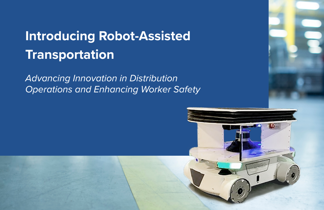 Gildan Introduces Robot-Assisted Transportation, Advancing Innovation in Distribution Operations and Enhancing Worker Safety Gildan's transportation robot featured against a factory floor and solid blue backdrop.