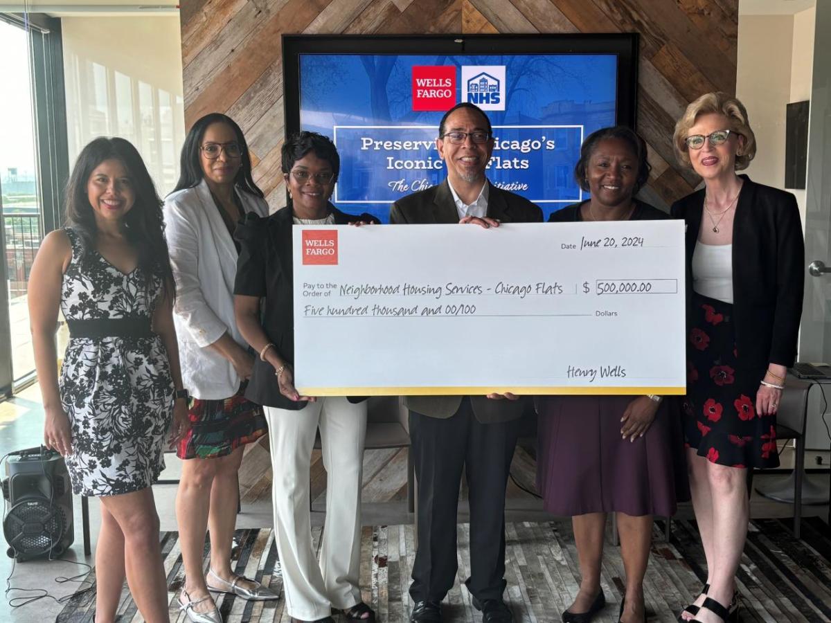 Representatives from the Wells Fargo Foundation and Neighborhood Housing Services of Chicago celebrate a new grant focused on stabilizing housing for Chicago renters and homeowners. Wells Fargo awards $500,000 grant to Neighborhood Housing Services of Chicago, Inc.