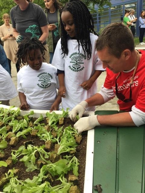 Wells Fargo Team Member Dan Sweeney joined The Kitchen Community to help Chicago Public School students plant a new Learning Garden at Wendell Smith Elementary School. The bank donated $2 million to the nonprofit to build hundreds more gardens across the country.