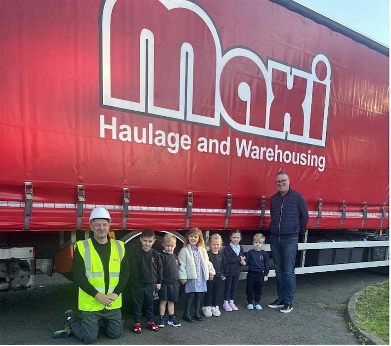 Picture: Children from St Aidan’s with William Story (Maxi) and Graeme Wands (Wesco Anixter) with Maxi van.