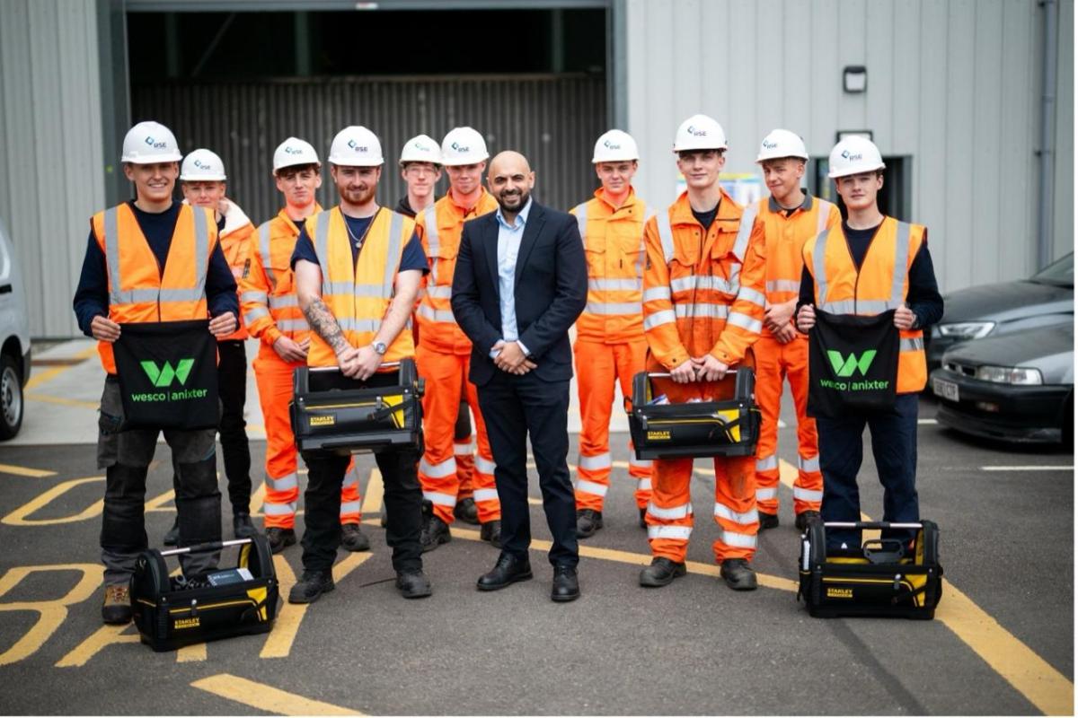 Picture: Zubi Hussain, Wesco Business Development Manager EES UK and new RSE apprentice cohort with their toolkits 