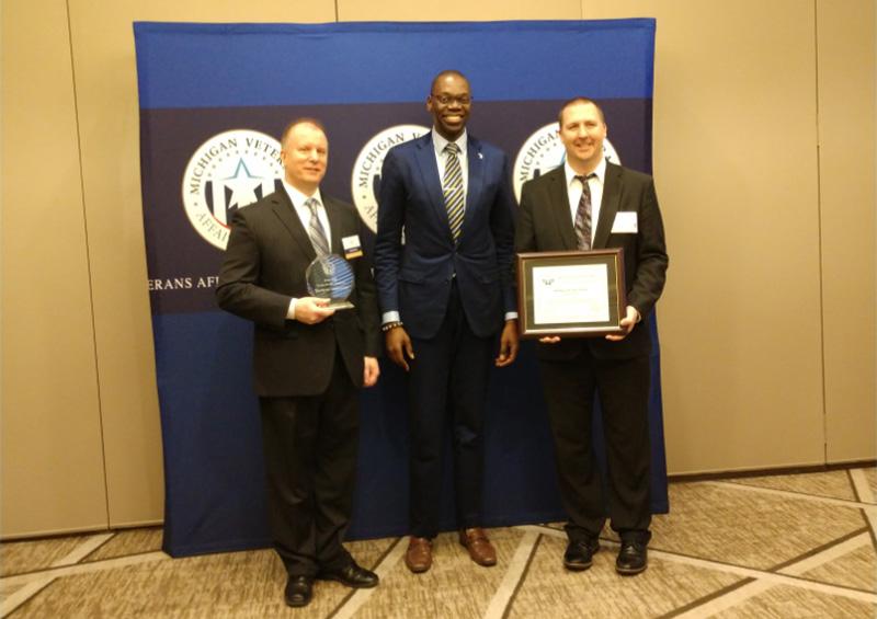 Members of Whirlpool Corporation's Veteran's Association accept the Gold Level award.