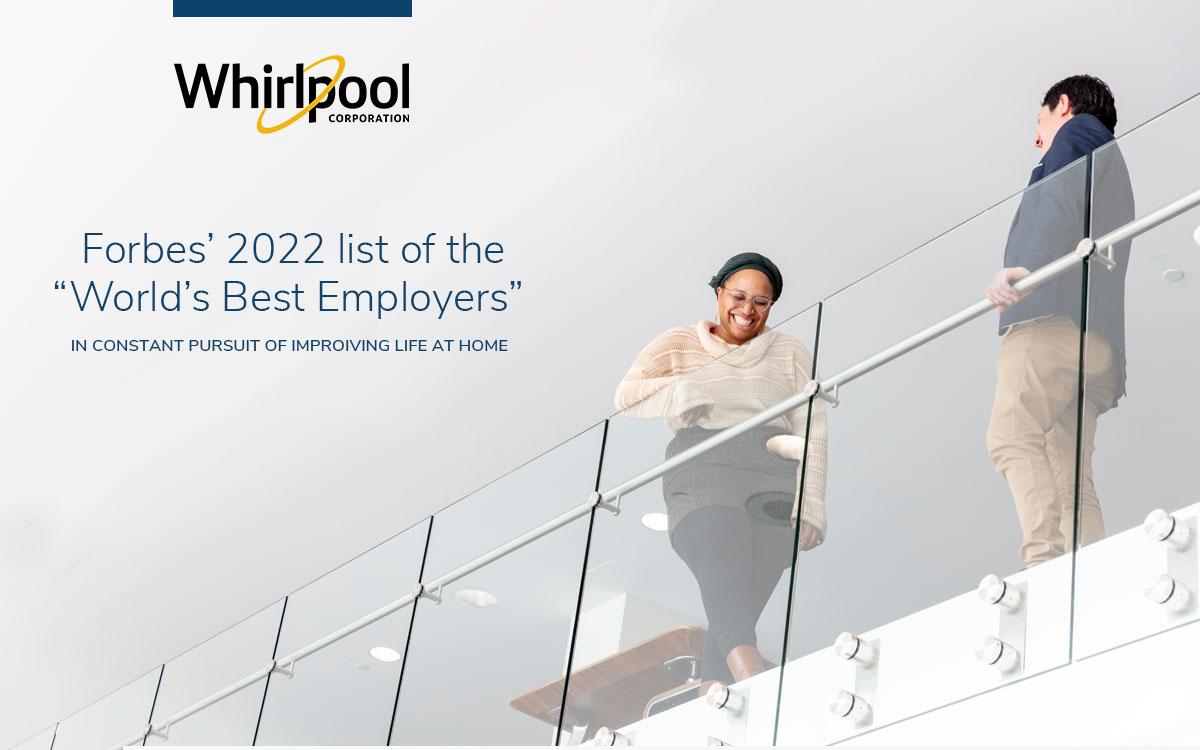 people near a glass wall - Forbes’ 2022 list of the “World’s Best Employers”