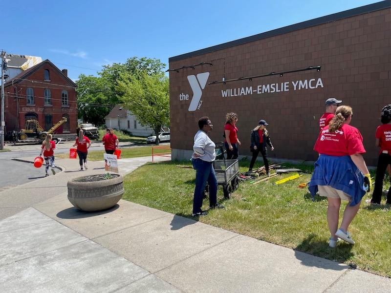 KeyBank volunteers working on the grounds outside of the William-Emslie YMCA.