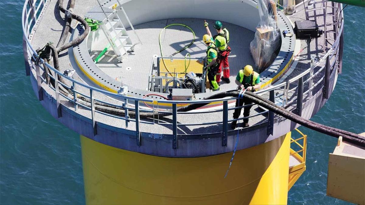 win turbine at sea under construction