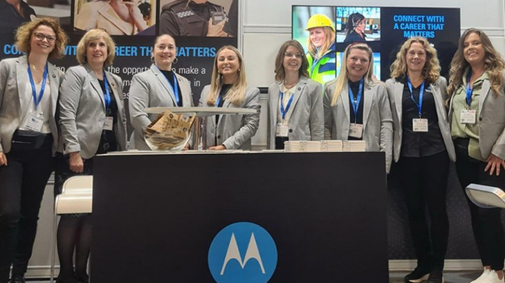 Group of women stood together at a the Women in Business and Tech Expo