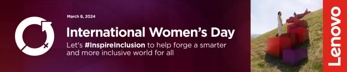 International Women's Day banner and Lenovo logo. A person stepping up large red blocks outdoors.