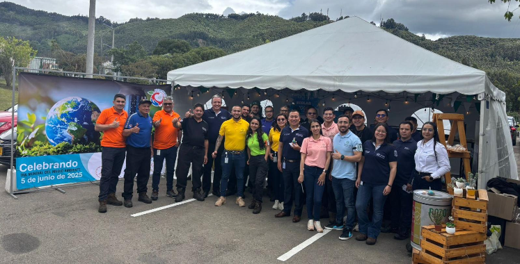 Group photo outside under a tent