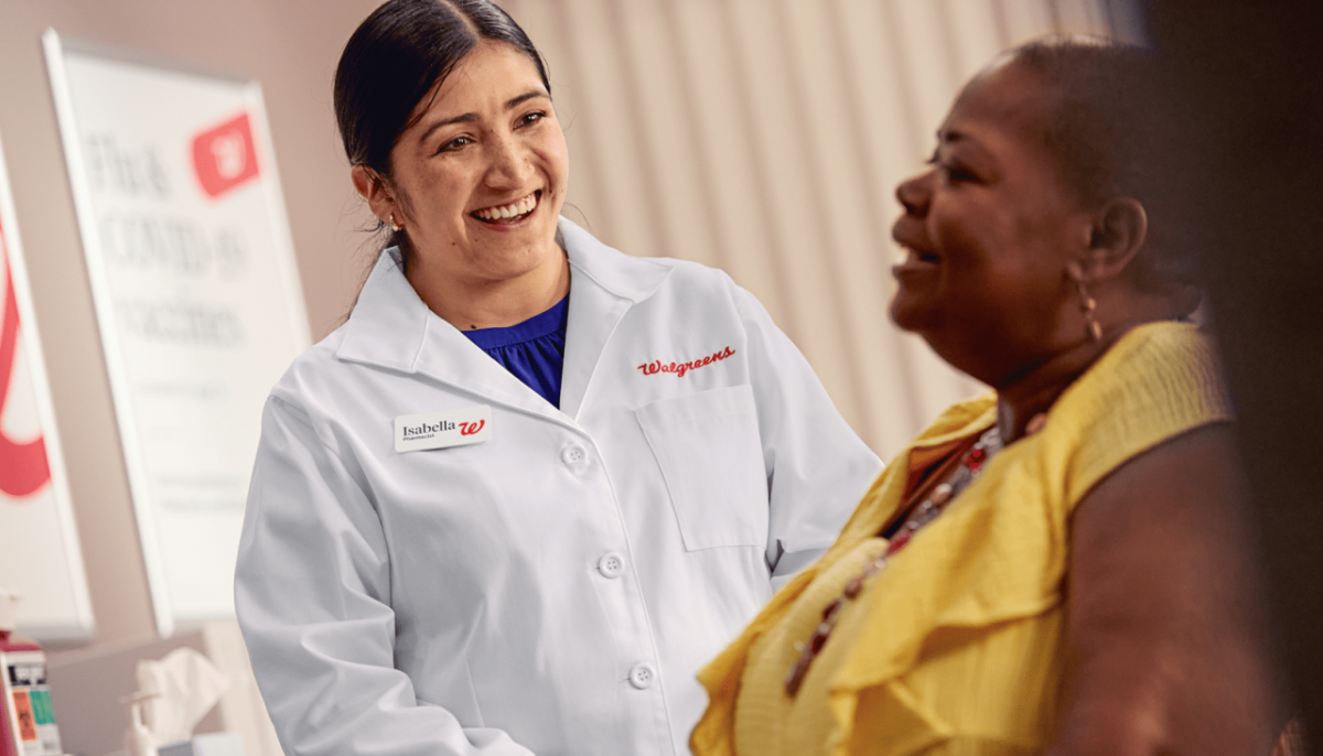 A young pharmacist seeing a patient 