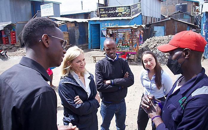Laura Kohler talking to group on a Nairobi street