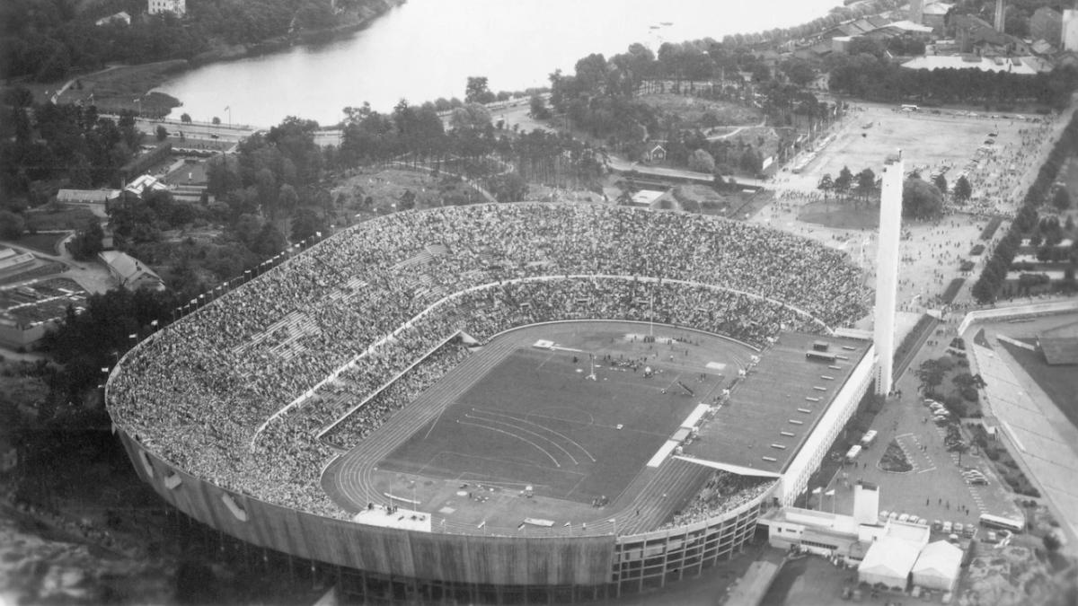 aerial view of a large stadium, spectators in the stands