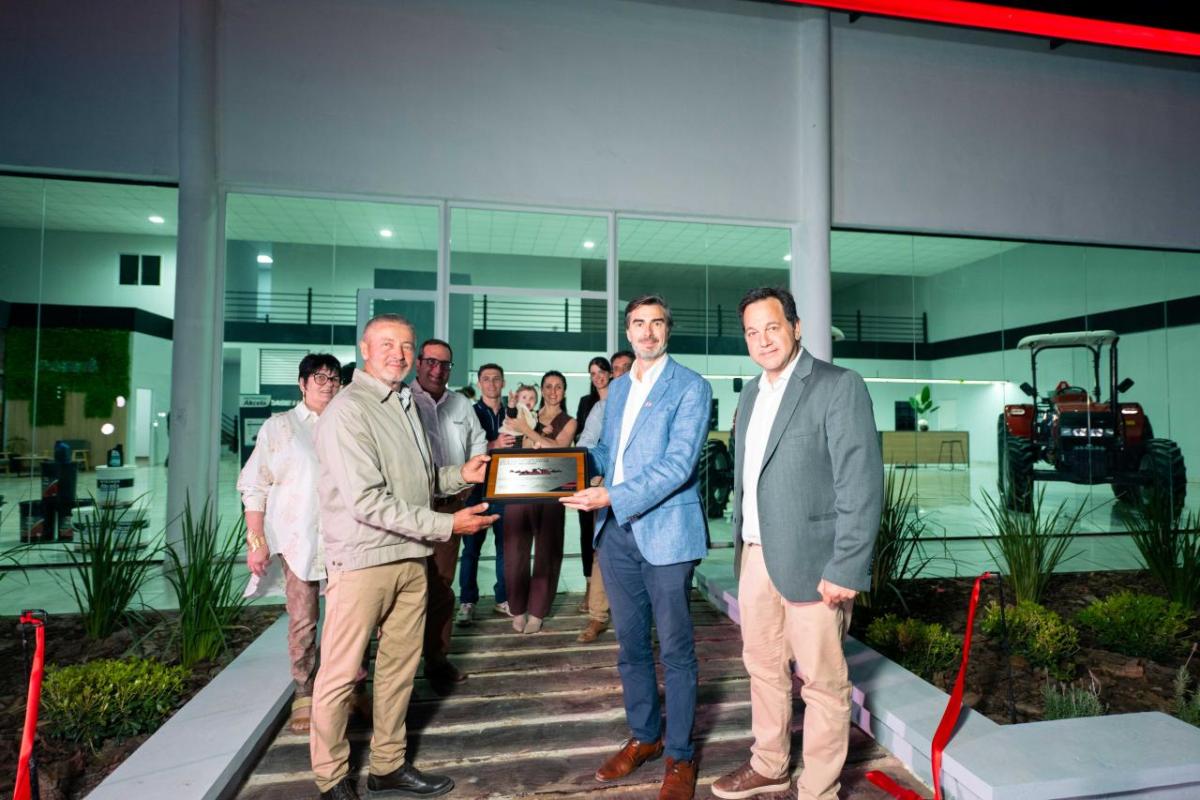 People holding a plaque