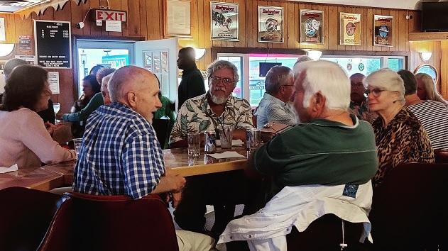 Group of people sitting at a table in American Legion