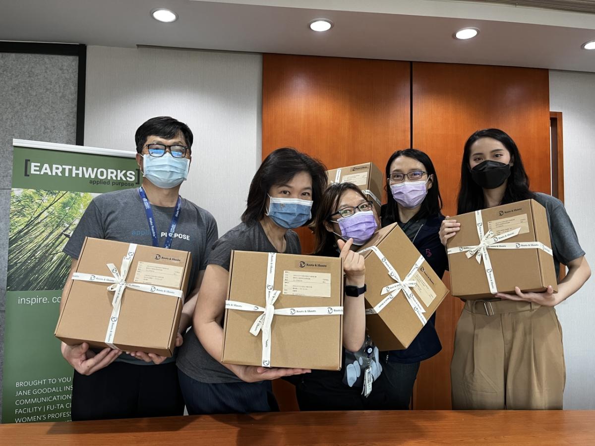 people holding award boxes