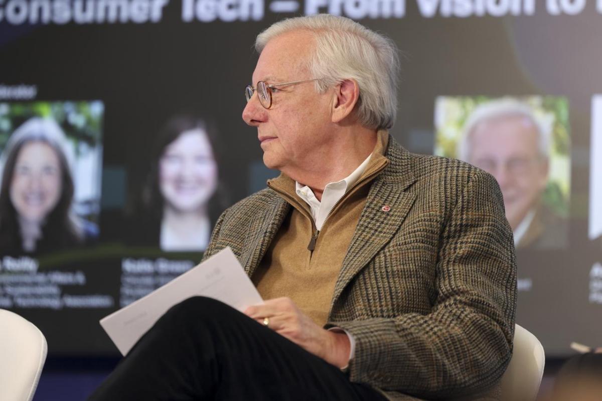 person sitting on a stage