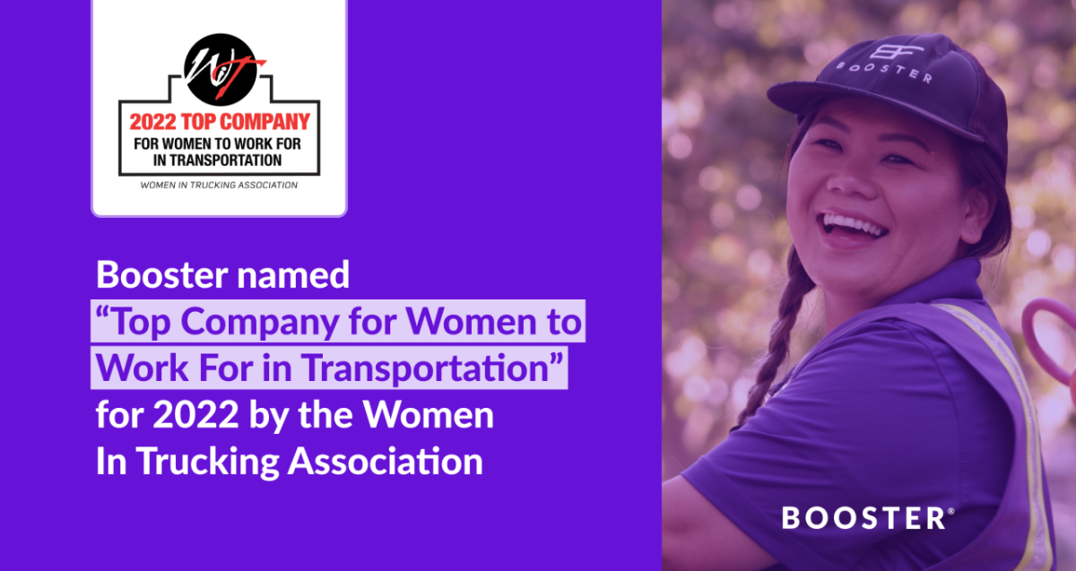 Against a purple background, the words "Booster named 'Top Company for Women to Work For in Transportation' for 2022 by the Women in Trucking Association." To the right, a woman in a Booster service professional uniform smiles at the camera. 