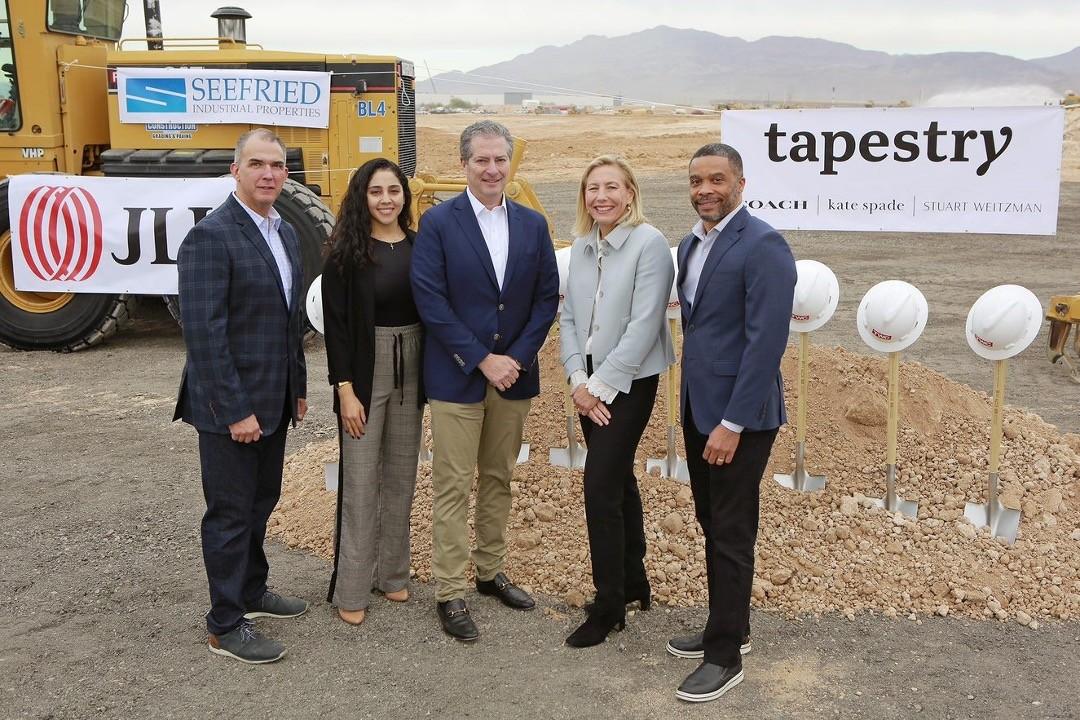 Joanne Crevoiserat and five others at a ground breaking ceremony.