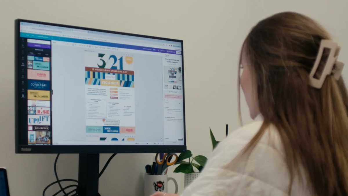 Someone looking at a monitor