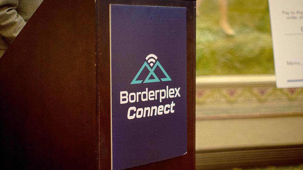 A podium with text "Borderplex Connect"