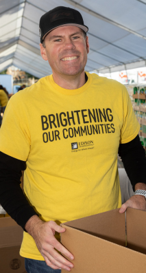 A volunteer with a box.