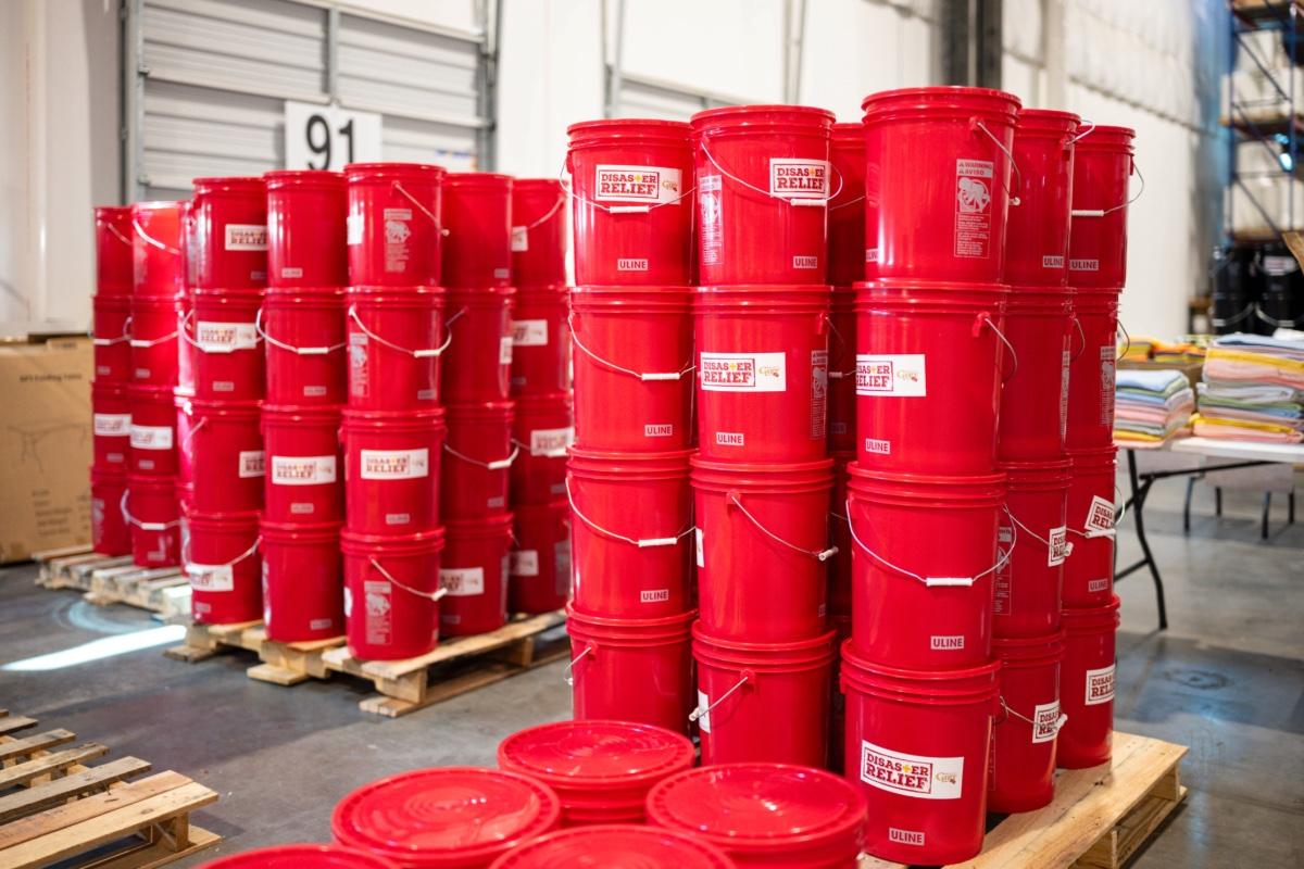 Stack of flood relief buckets donated from Southwire