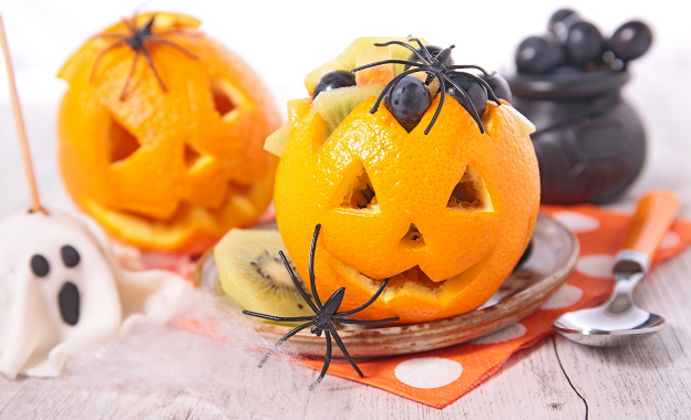 This Halloween, try cutting and arranging fruits and veggies to look like pumpkins, ghosts, or mummies.