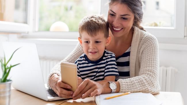 Parent and child using smartphone